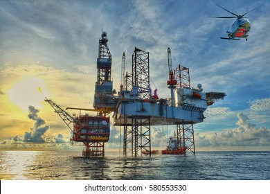 HDR image of Helicopter transfer crews or passenger to work in offshore oil and gas industry,Offshore construction platform for production oil and gas, Oil and gas industry, Production platform. 