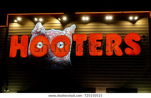 HDR image, Hooters\
casual dining restaurant signage - Saugus, Massachusetts USA -\
September 18, 2017