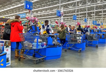 HDR image, Walmart retailer store cash register check out lanes, paying customers - Saugus, Massachusetts USA - February 5, 2018