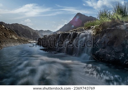 HDR Landscape of Oman. wadi al khoud muscat Oman. Reflection view of Cloud and rock waterfall.
