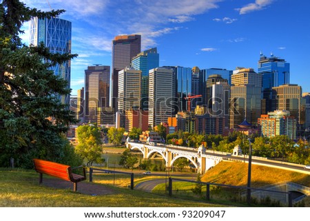 HDR Park bench overlooking Skyscrapers of Calgary, Alberta, Canada