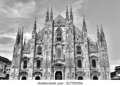 HDR photo of the famous Cathedral Duomo di Milano on piazza in Milan, Italy, during a sunny nice day - Powered by Shutterstock