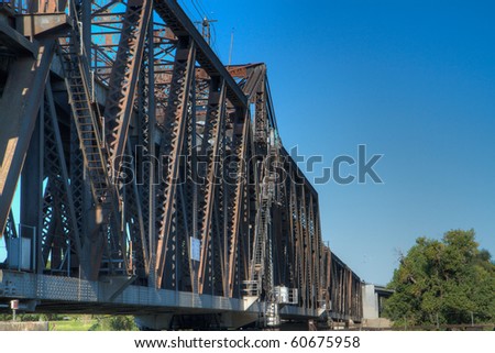 HDR tonemapped image of an old rusty train bridge