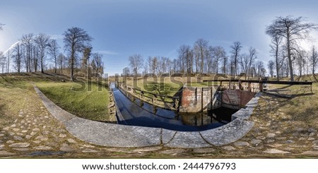hdri 360 panorama near gateway lock construction on river, canal for passing vessels at different water levels. Full spherical 360 degrees seamless panorama in equirectangular projection