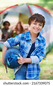 He Cant Wait For The Camp Sleepover. A Boy Standing In Front Of His Campsite.