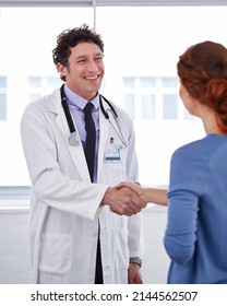 He Has A Good Bedside Manner. Cropped Shot Of A Doctor And Shaking His Patients Hand.