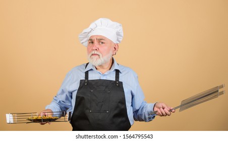 He Prefer Grill Food. Picnic And Barbecue. Kitchen Rules. Prepare Dinner For Family. Family Weekend. Senior Man In Chef Hat. Cook Men With Beard. Cooking Utensils For Barbecue. Looking Perfect.