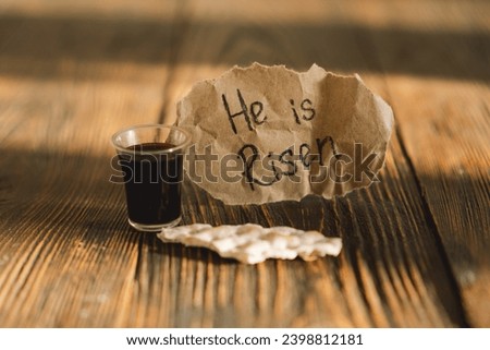 He is risen. Communion. Religious tradition of breaking bread. Bread and wine as a sign of memory of Christ's sacrifice.