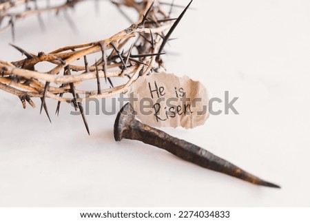 He is Risen. Jesus Crown Thorns and nails and cross on a white background. Crucifixion Of Jesus Christ. Passion Of Jesus Christ. Concept for faith, spirituality and religion. Easter Day