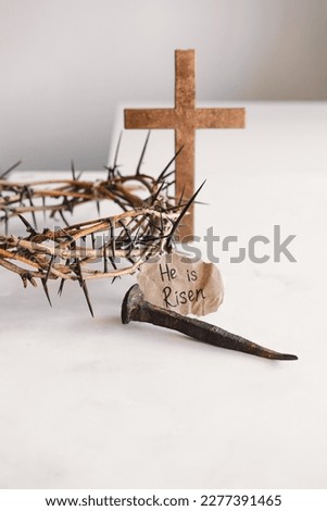 He is Risen. Jesus Crown Thorns and nails and cross on a white background. Crucifixion Of Jesus Christ. Passion Of Jesus Christ. Concept for faith, spirituality and religion. Easter Day