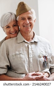 He Still Looks So Handsome In His Uniform. Cropped Shot Of A Senior War Veteran And His Wife.