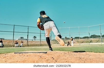 He throws nothing but fast pitches. Shot of a young baseball player pitching the ball during a game outdoors.