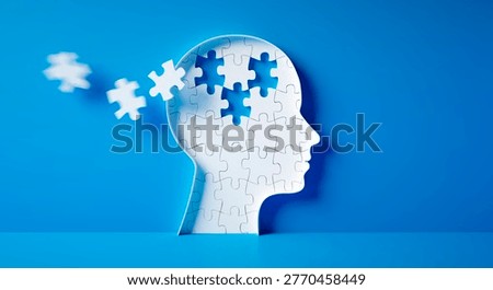 Head and brain diseases concept - missing pieces flying of the brain puzzle on blue background with copy space