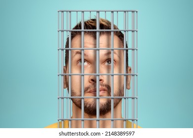 Head of a businessman in a cage. Opportunities are limited, business metaphor, a prison for the mind