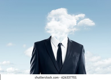The head of the businessman is covered with clouds , business concept .