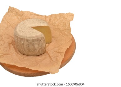 head of cheese on a wooden board and craft paper on a white isolated background and with free space for writing