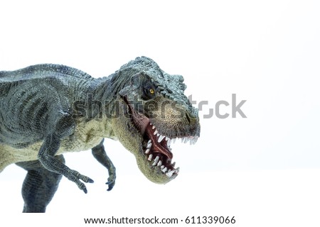 Head close of Green Dinosaur Tyrannosaurus Rex with open mouth in attack position - white background