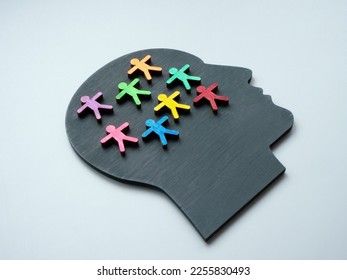 A Head with colorful figurines as concept of neurodiversity. - Shutterstock ID 2255830493