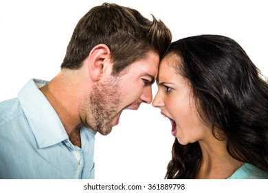 Head to head couple screaming having argument on white background