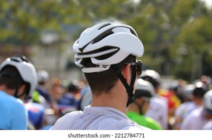 Head Of A Cyclist With Protective Helmet At The Start Of A Cycling Race