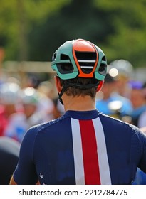 Head Of A Cyclist With Protective Helmet At The Start Of A Cycling Race