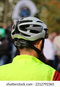 Head Of A Cyclist With Protective Helmet At The Start Of A Cycling Race