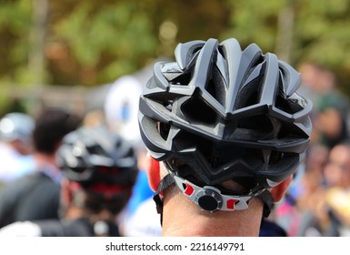 Head Of A Cyclist With Protective Helmet At The Start Of A Cycling Race