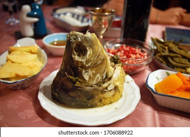 Head Of A Fish Served On Traditional Rosh Hashanah Dinner Table Blessings.