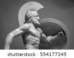 Head in helmet Greek ancient sculpture of warrior.