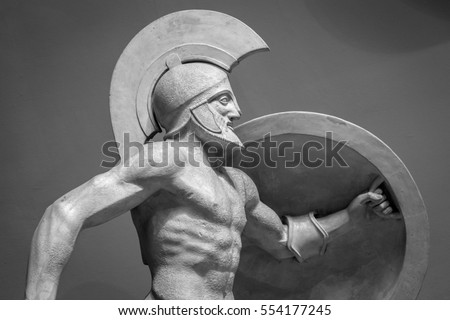 Head in helmet Greek ancient sculpture of warrior.