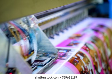 Head Inkjet During Printing On Pink Vinyl Banner