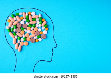Head with nutritional supplements and pills of abstract brain. 