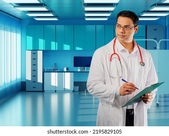 Head Physician Of Clinic. Male Doctor Is Holding Clipboard. Guy In Uniform Of Head Doctor. Man Indoors Modern Clinic. Chief Physician Career. Doctor With Stethoscope Around His Neck