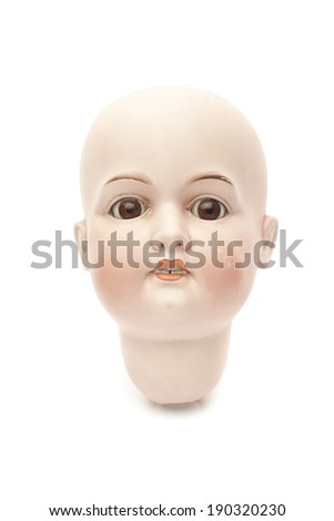 Head of porcelain doll isolated on white background
