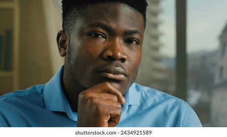 Head shot African American man ethnic thoughtful businessman think hold hand on chin doubt decision challenge solving business idea looking at camera nod head decide solution accept strategy support - Powered by Shutterstock