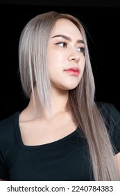 head shot of caucasian beauty girl ashen hair wear black t shirt with studio lighting for cosmatic black background - Shutterstock ID 2240784383