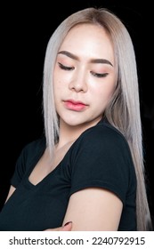 head shot of caucasian beauty girl ashen hair wear black t shirt with studio lighting for cosmatic black background - Shutterstock ID 2240792915