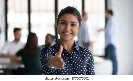 Head shot of friendly indian boss greeting client stretch out hand welcoming express amity good manners meet job vacancy applicant, first acquaintance, human resource HR manager recruiter work concept - Shutterstock ID 1770073802