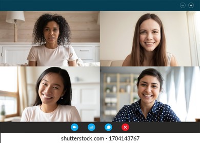 Head shot portrait four multiethnic millennial girls using video call application laptop webcam screen full frame view. Distant chat, virtual communication, modern technology, webinar activity concept
