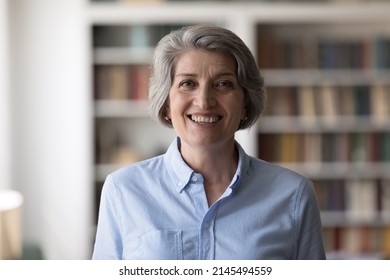 Head shot portrait of happy middle aged old hoary attractive successful businesswoman entrepreneur employee posing in modern home office, professional corporate career, female leadership concept. - Shutterstock ID 2145494559