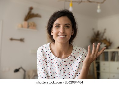 Head Shot Portrait Of Happy Woman In Casual Smiling, Looking And Speaking At Camera During Video Call From Home, Having Job Interview Talk. Teacher, Coach, Blogger Holding Webinar. Screen View