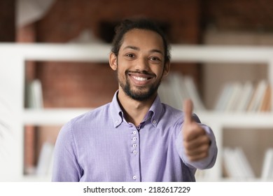 Head Shot Portrait Smiling African Ethnicity Businessman Showing To Camera Thumbs Up Hand Gesture, Recommending Good Customer Services, Gives Positive Feedback Feels Satisfied, Approval Sign Concept