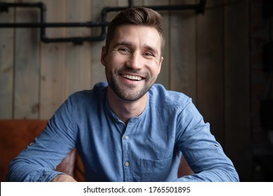 Head Shot Portrait Smiling Caucasian Man Sitting Indoors Having Pleasant Web Cam Videoconference On-line Chat By Work Or Informal Speak Use Pc. Job Interview, Tutoring Video Call, Modern Tech Concept