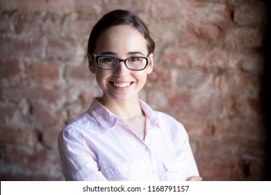 Head Shot Portrait Of Successful Businesswoman, Business Owner Wearing Eyeglasses Looking At Camera And Smiling In Office. Professional Teacher, Corporate Client, Hr Manager Posing For Photo