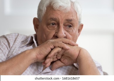 Head Shot Upset Older Man Lost In Thoughts Or Memories Close Up, Crying, Unhappy Mature Grandfather Feeling Unwell And Lonely, Thinking About Health Problem, Mental Disorder, Elderly And Loneliness