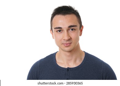 Head And Shoulder Portrait Of A Handsome Young Man With Short Dark Hair