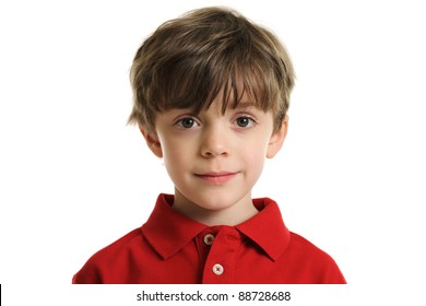 Head And Shoulders Portrait Of A 6 Year Old Boy Isolated On A White Background