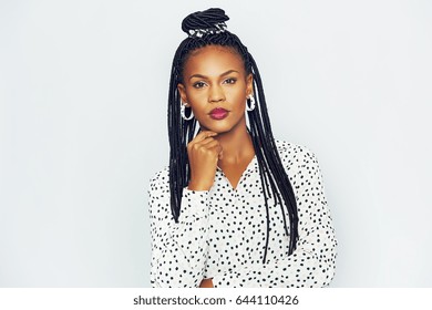 Head And Shoulders Portrait Of Fashionable Black Woman With Long Braided Hair