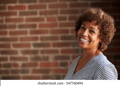 Head And Shoulders Portrait Of Mature Businesswoman