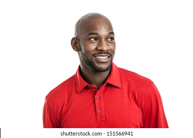 Head And Shoulders Studio Portrait Of A Handsome Black Man In His Late 20s Smiling Looking Away Isolated On White